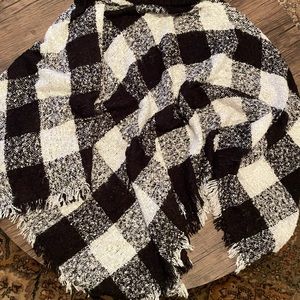 Buffalo check poncho from boutique. Black and white with turtleneck and fringe.